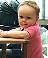In the conservatory leaning on a table